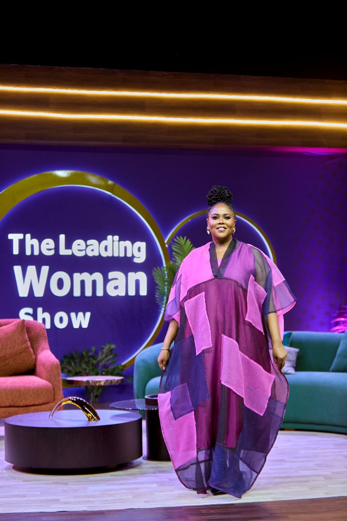 Abosede George-Ogan speaking on a panel stage with authority